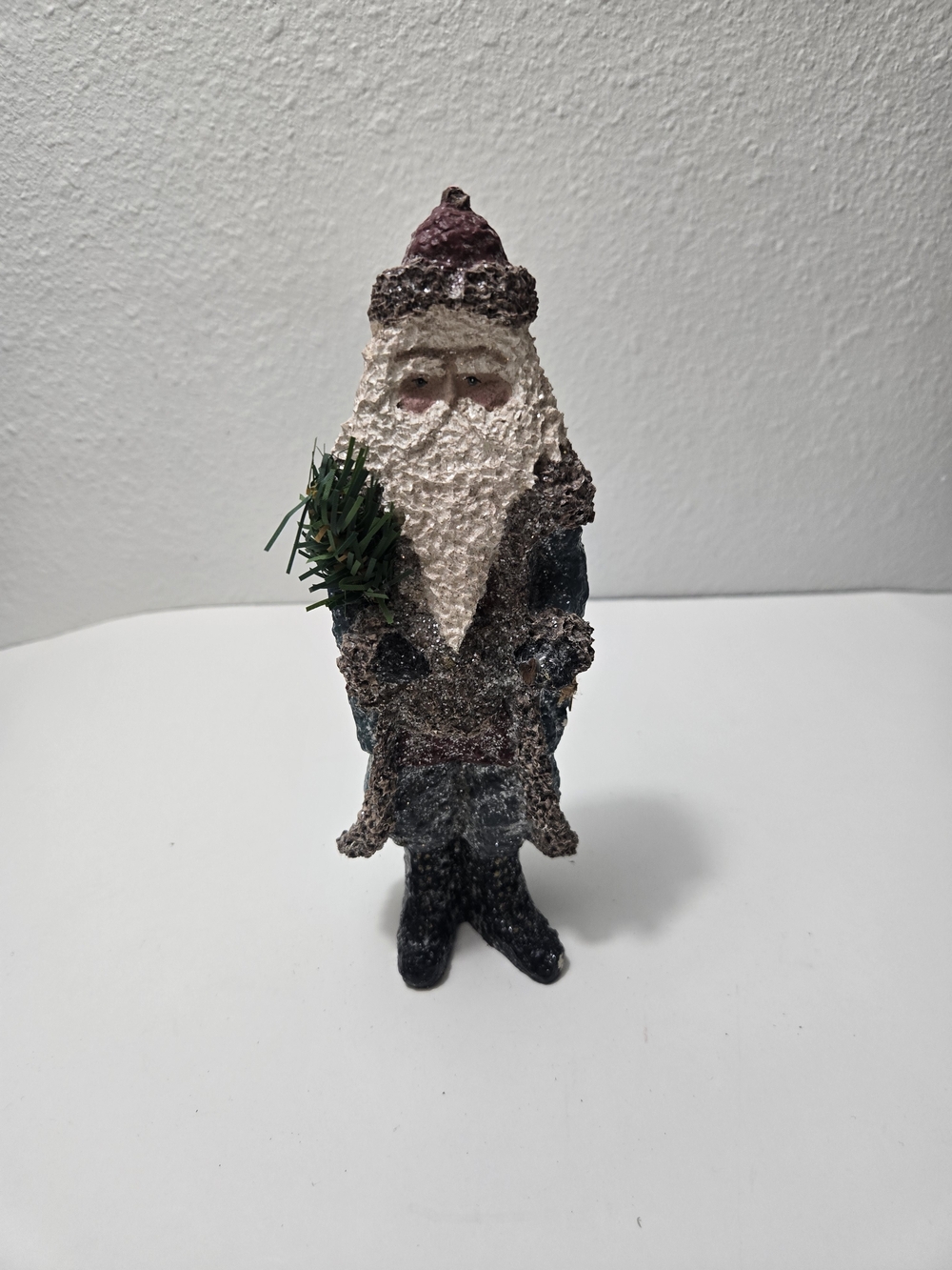 This item is a vintage Enesco Belsnickle Santa figurine